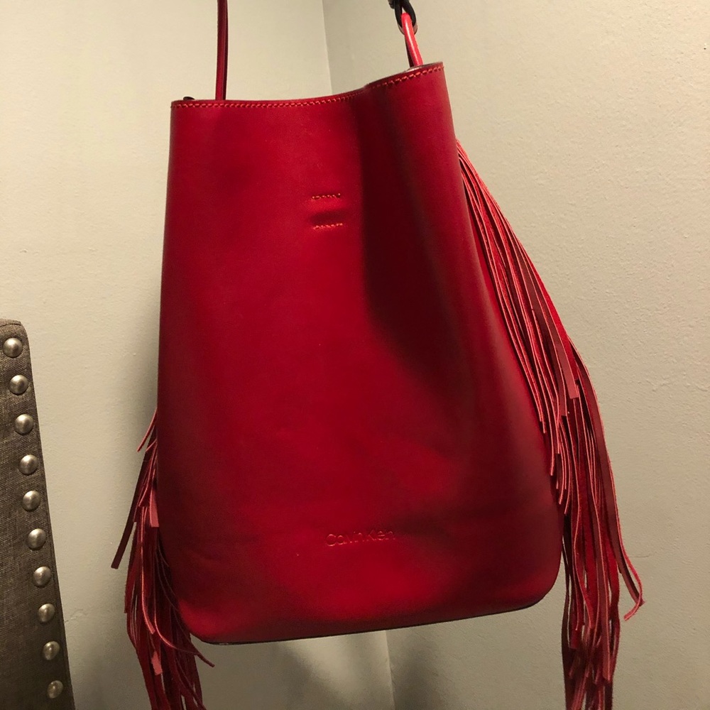 Calvin Klein fringe red bucket bag